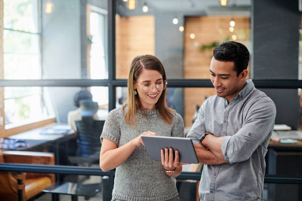Hiring professionals reviewing screening information together